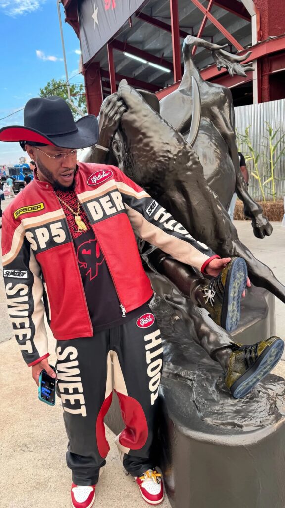 Young Thug with the Sp5der x Adidas Superstar brand activation sculpture created by Smash Design
